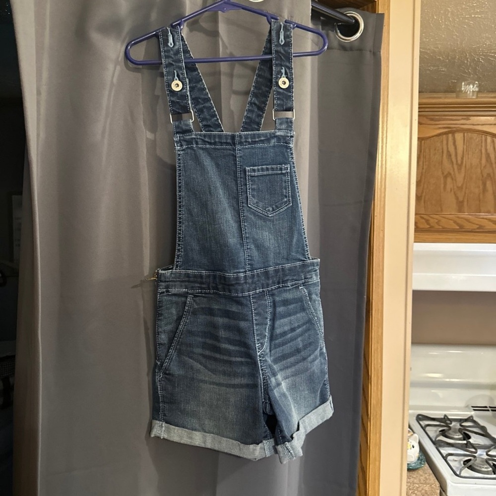 Denim shorts overalls. 
Never worn.
